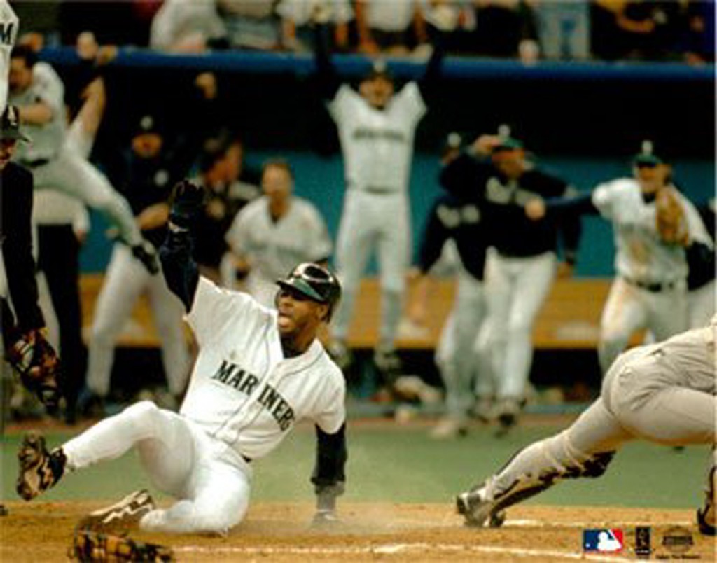 Ken Griffey Jr. sliding in home to beat the Yankees in 1995