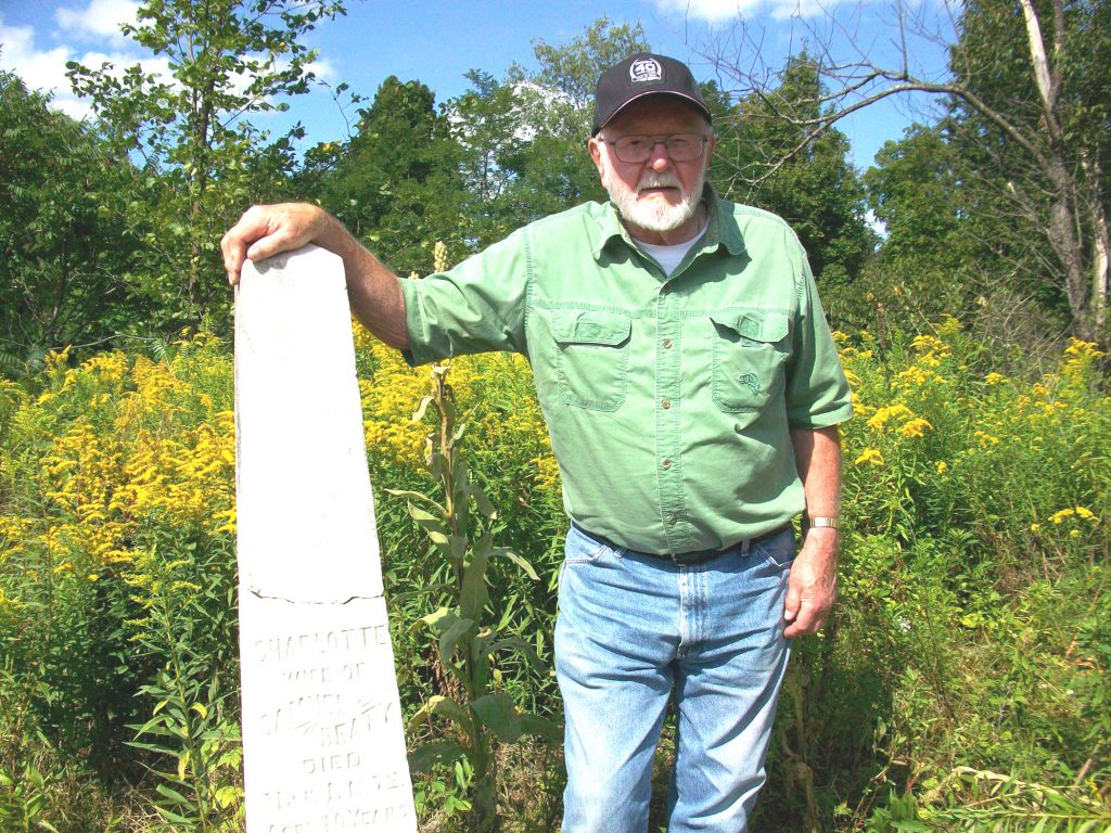 Ray Mosher with grave stone for our Great, Great grandmother, wife of Aaron Mosher, killed in Civil War while with the New York Volunteers